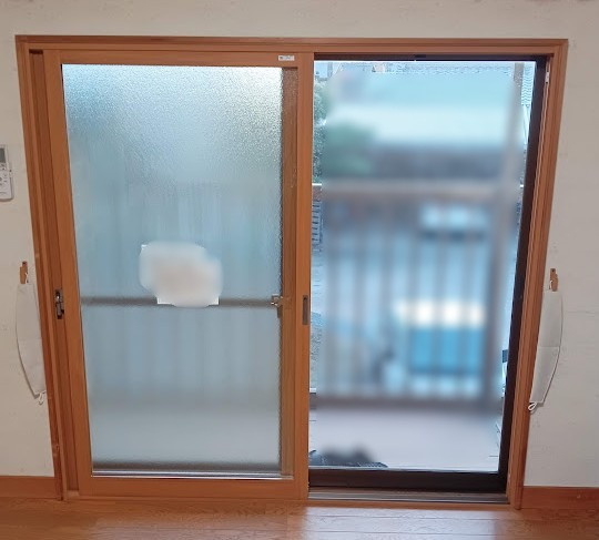 まどありー。太田店の２階の掃き出し窓に内窓設置の施工後の写真1